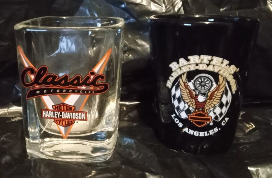 Harley Davidson Shot Glasses 2.5 inches tall (one black, one clear)