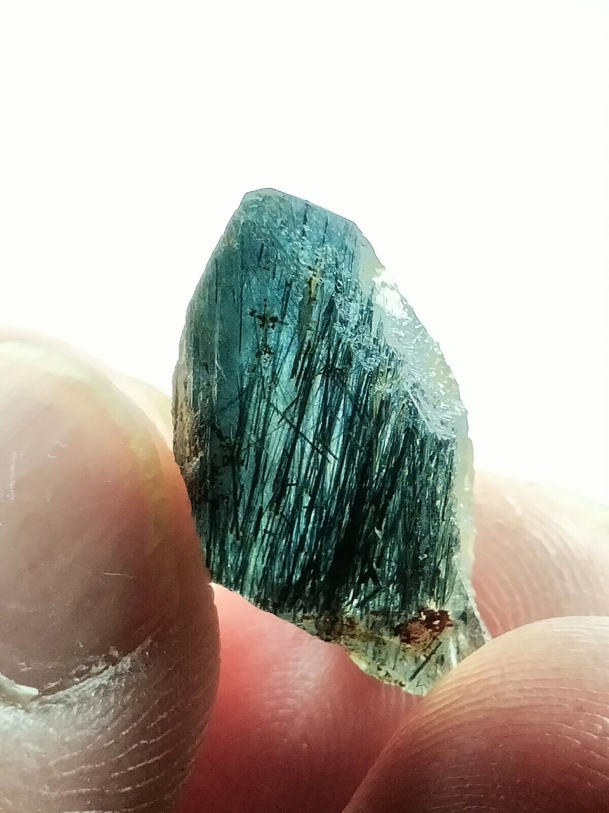 Magnesio-Riebeckite included bluish Quartz small crystal from pak. 