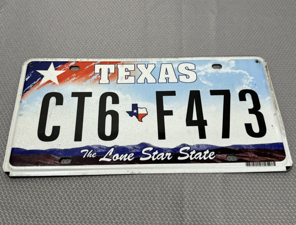 Texas License Plate Car 2011 Lone Star State Colorful Clouds Mountains CT6 F473