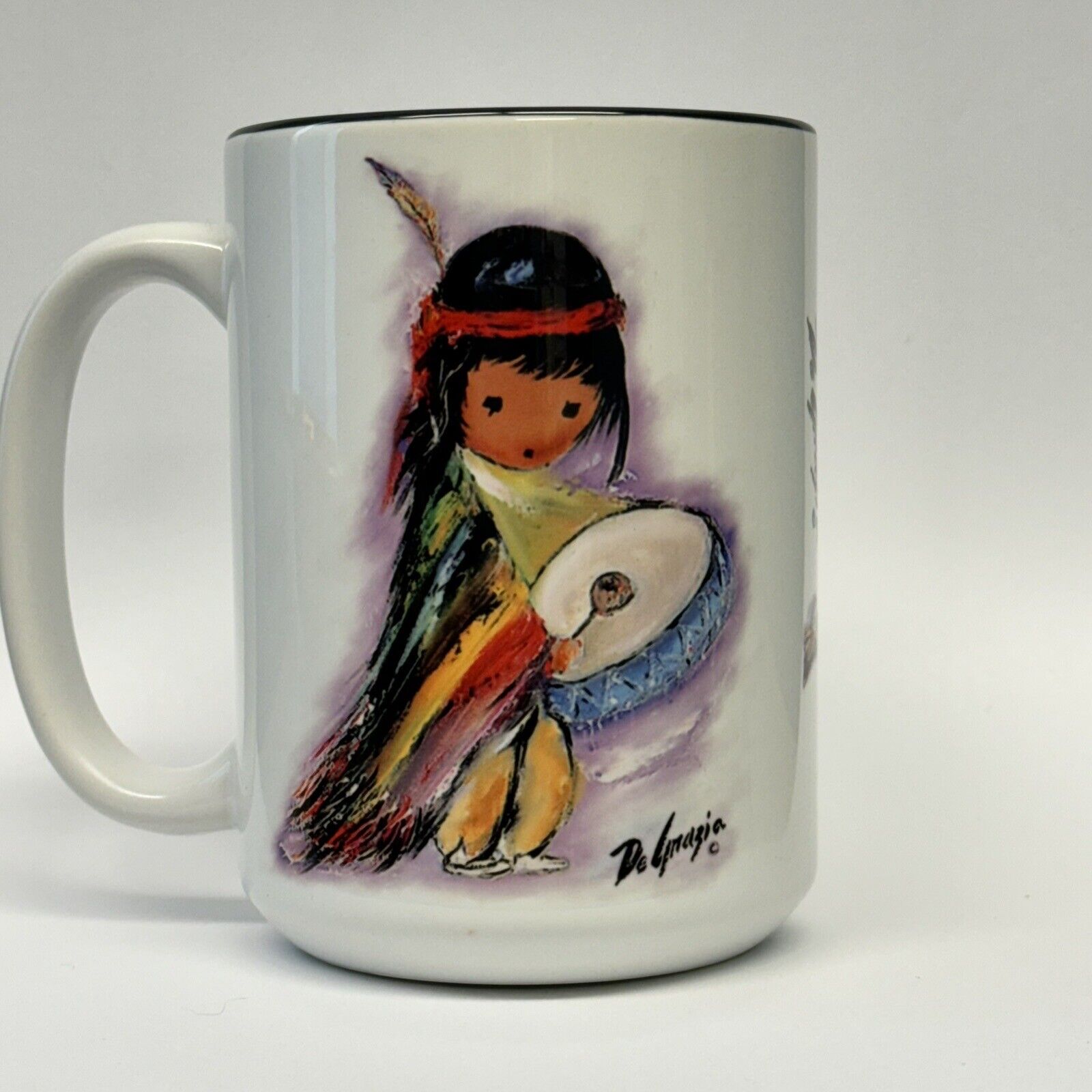 Ettore “Ted” De Grazia Coffee Mug Featuring A Print Of “Pima Indian Drummer Boy”