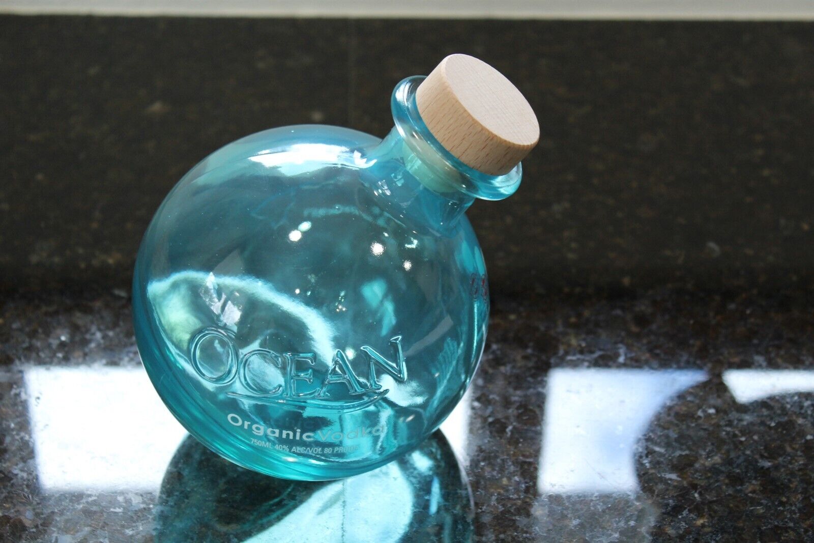 Ocean Organic Vodka Empty Blue Glass Bottle With Wood Stopper