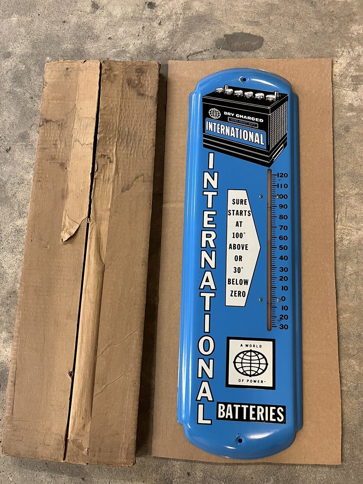 Original NOS International Batteries Thermometer Gas Oil Tires Sign