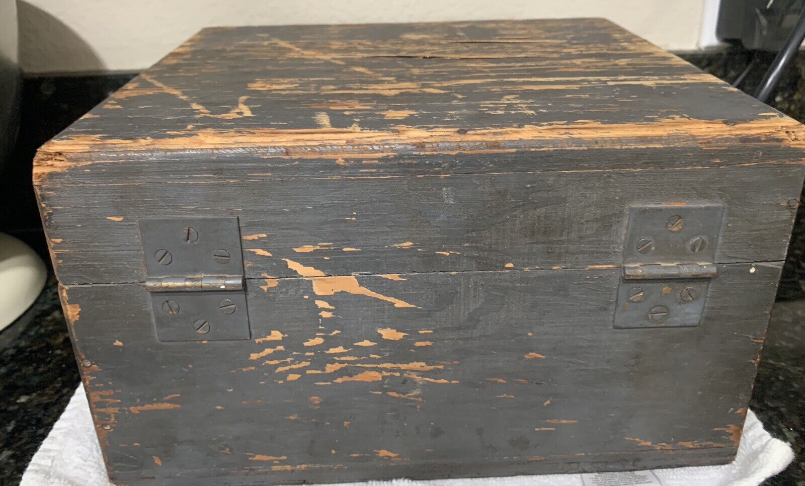 antique wooden box with hinged lid
