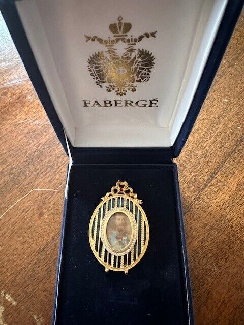 FABERGE miniature picture frame in box.