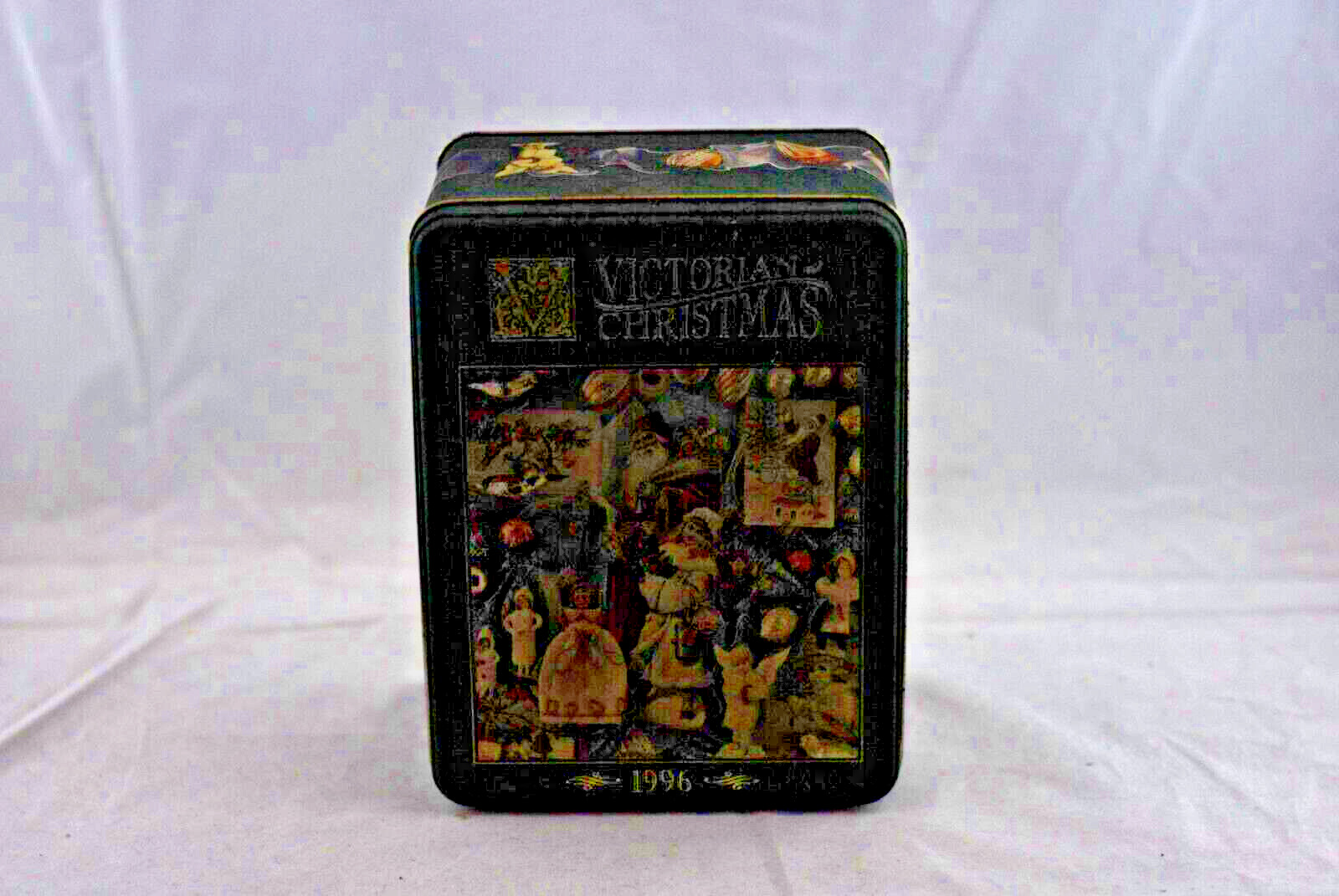 Vintage Victorian Christmas puzzle tin can