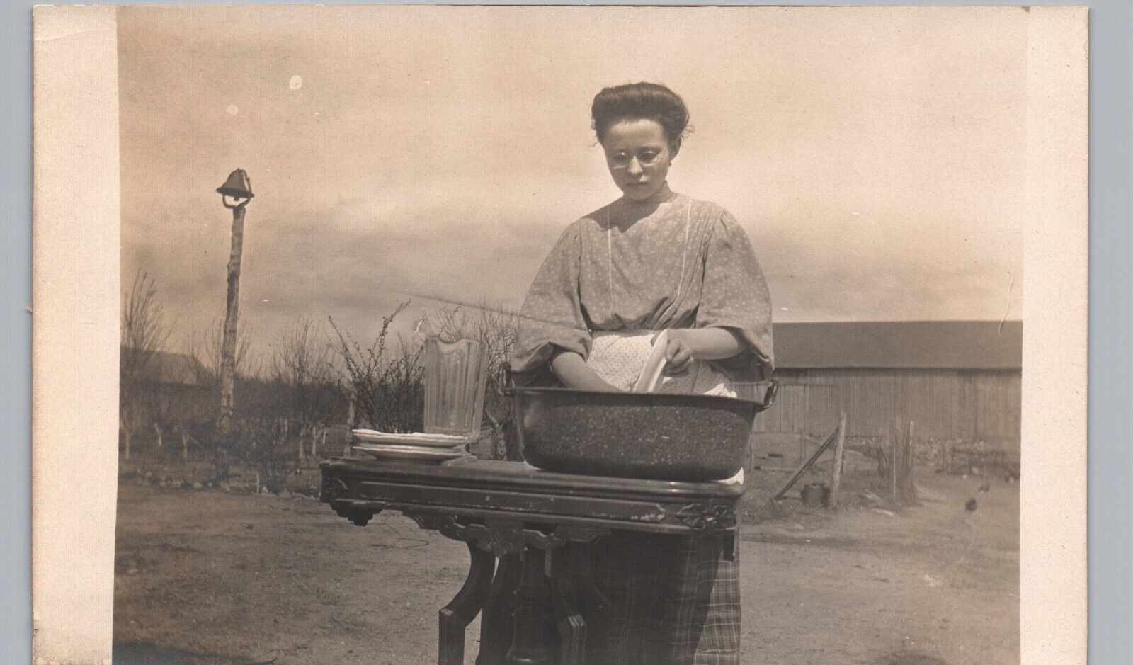 YOUNG FARM LADY WASHING DISHES real photo postcard rppc occupational woman