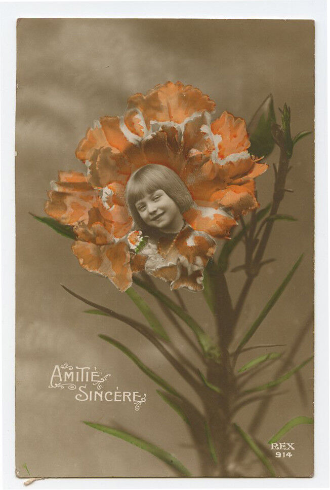 c 1918 Child Children Little GIRL EATING FLOWER Kid photo postcard