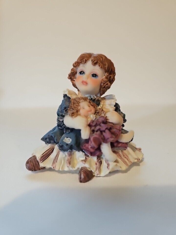 Vintage Little Victorian Girl Figurine with Doll