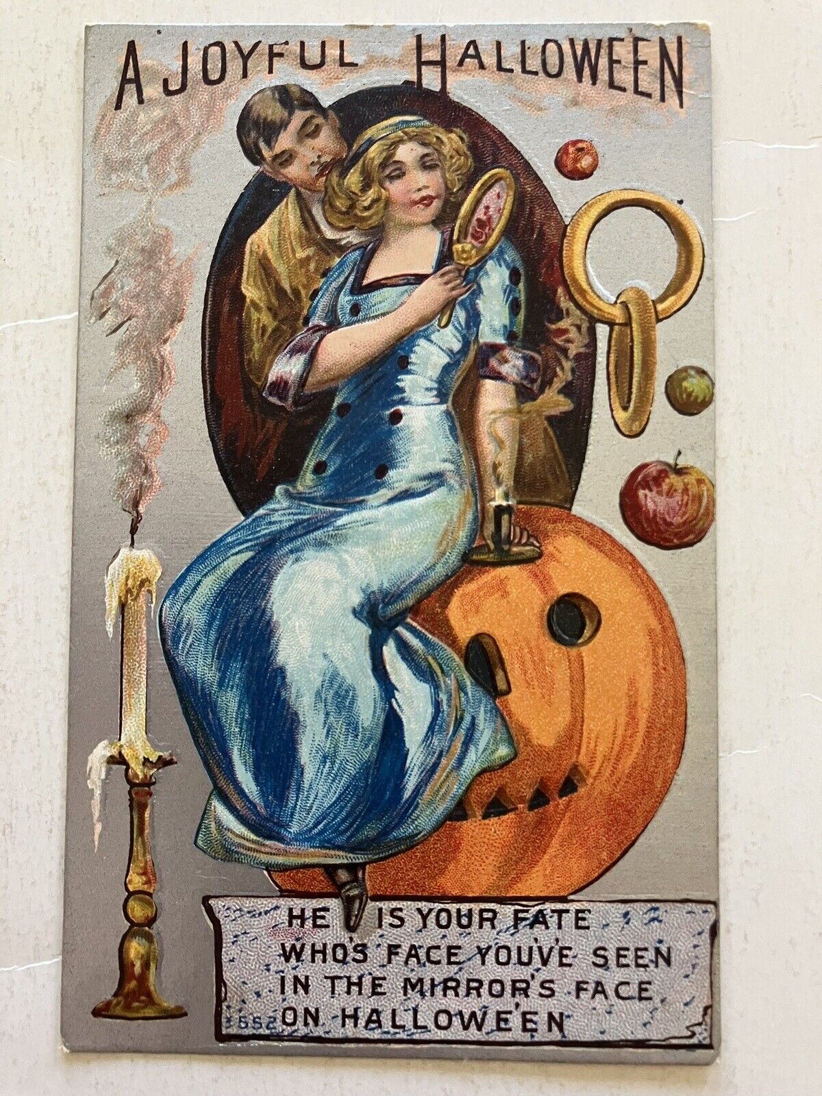 EARLY 1900’S UNKNOWN PUBL. HALLOWEEN POSTCARD  SILVER BACKGROUND MIRROR FATE