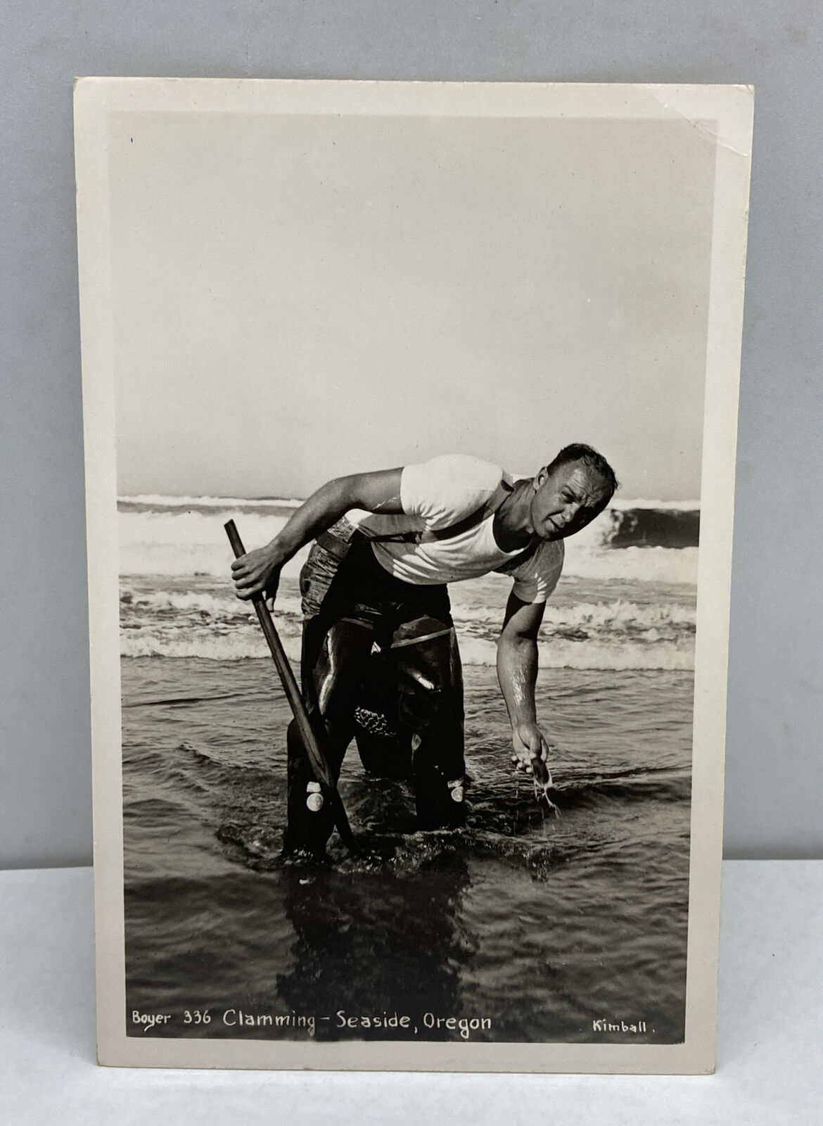 Seaside Oregon~Clamming~Man in Surf with Clam & Stick~  RPPC Damaged As Is