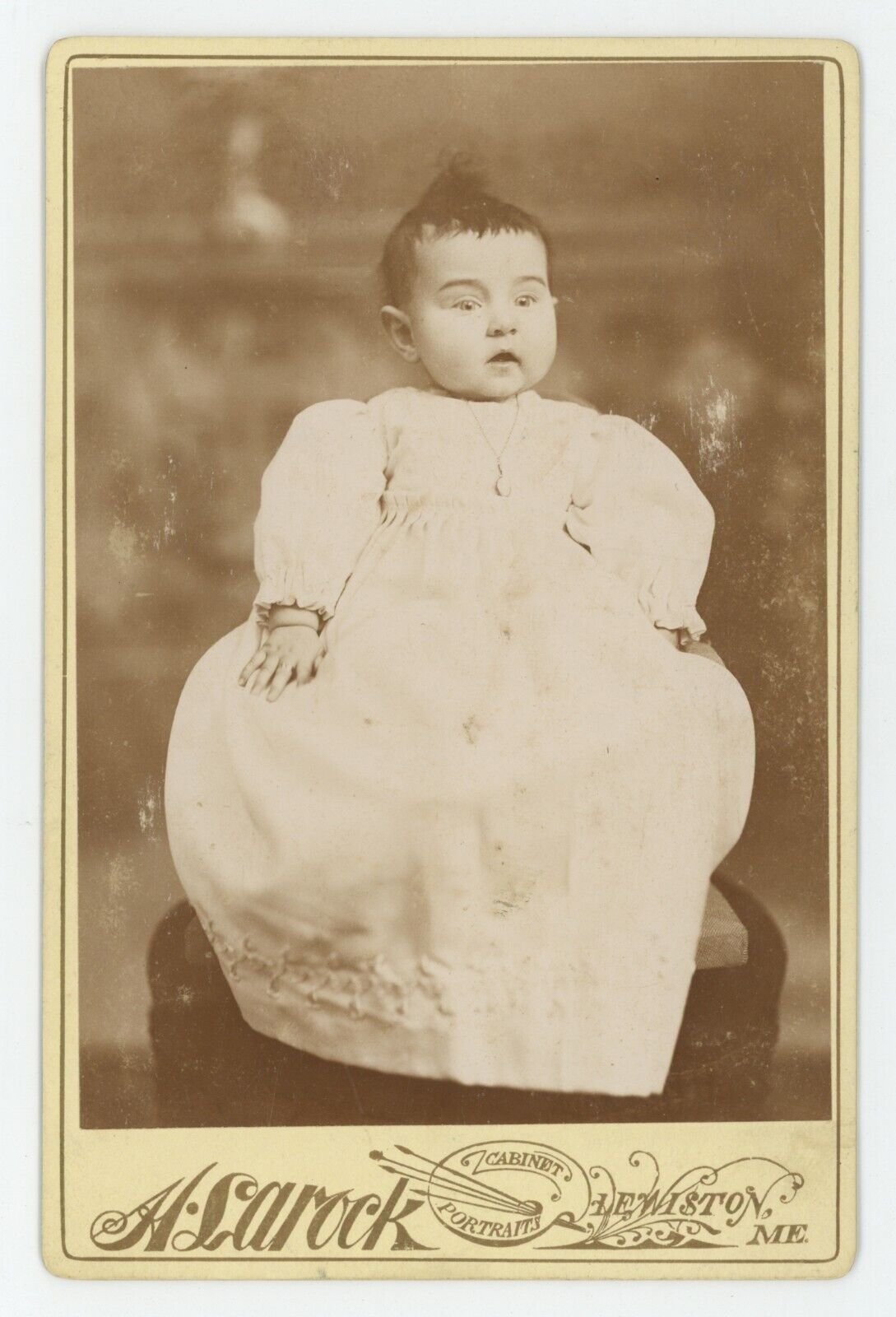 Antique c1880s Cabinet Card Adorable Baby Sitting in White Dress Lewiston, ME
