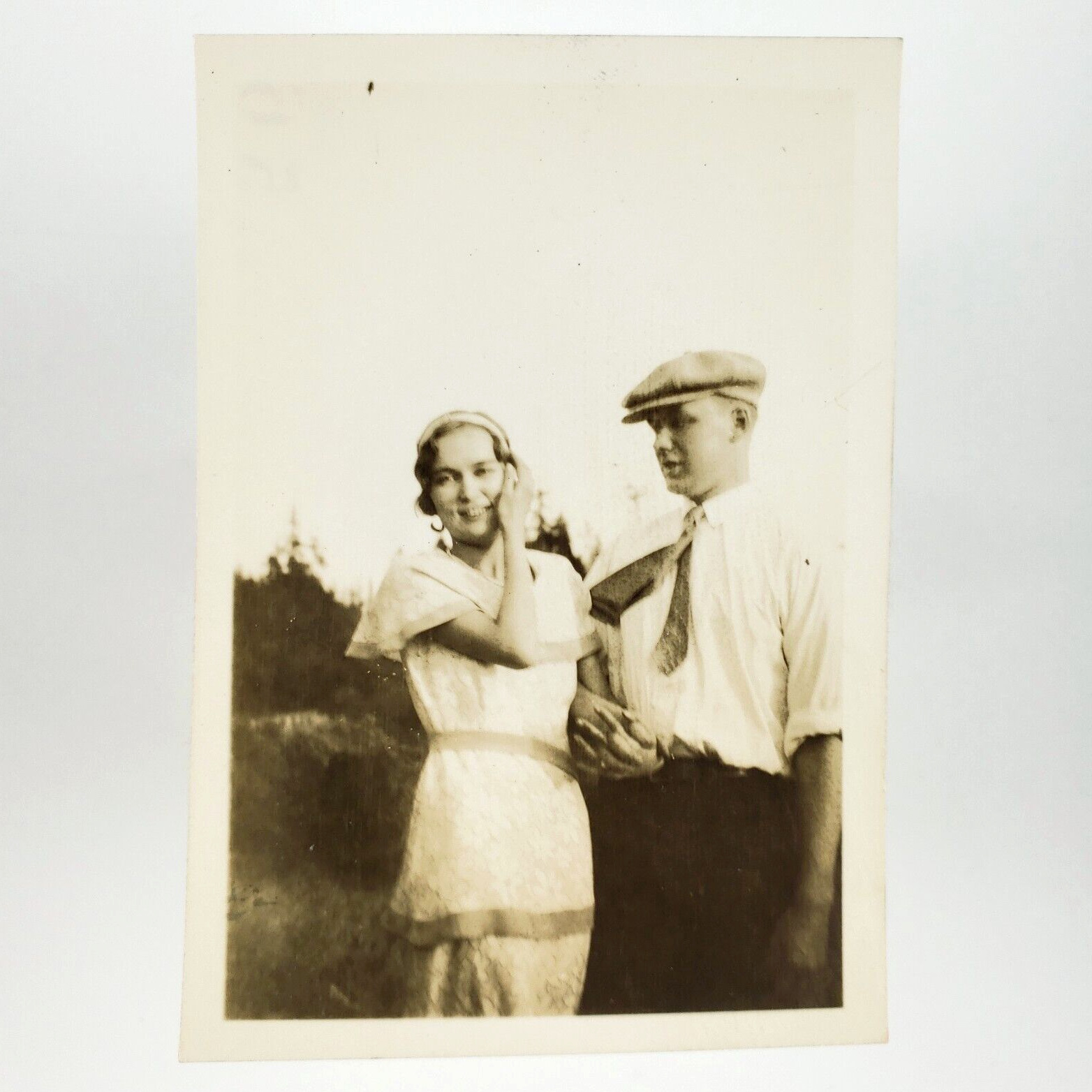 Man Admiring Pretty Girl Photo 1920s Windy Day Newsboy Hat Love Snapshot A4177