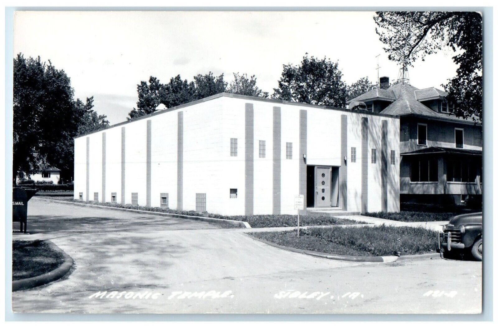 c1940\'s Masonic Temple Car Scene Street Sibley Iowa IA RPPC Photo Postcard