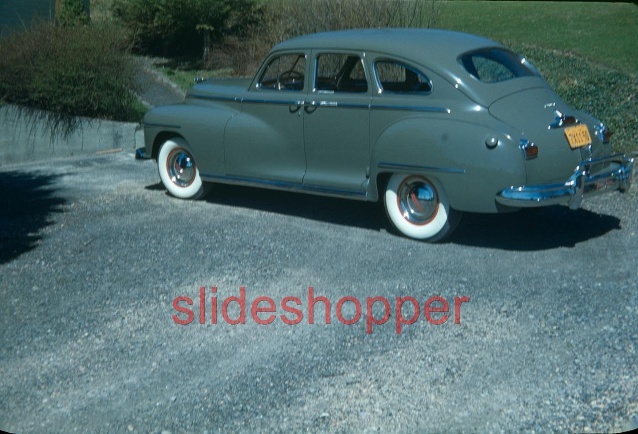 Slide Photo View of New car in 1948 Dodge Custom Sedan in Driveway