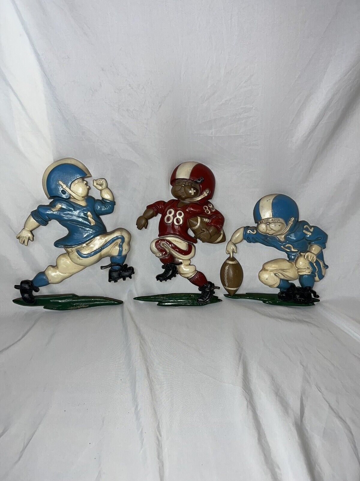 3 pc Vintage 1976 Homco Cast Metal Football Player Wall Hanging Plaque set