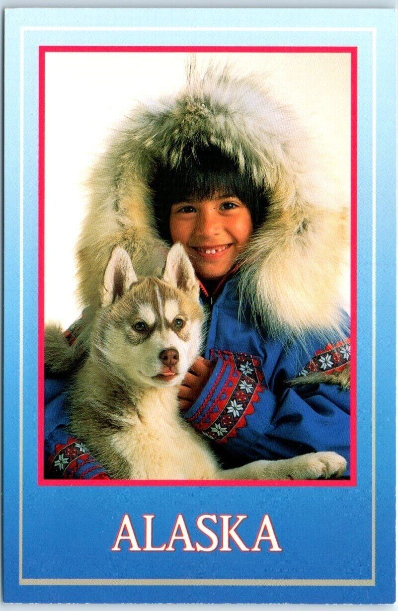 Postcard - Alaskan native girl with husky puppy - Alaska