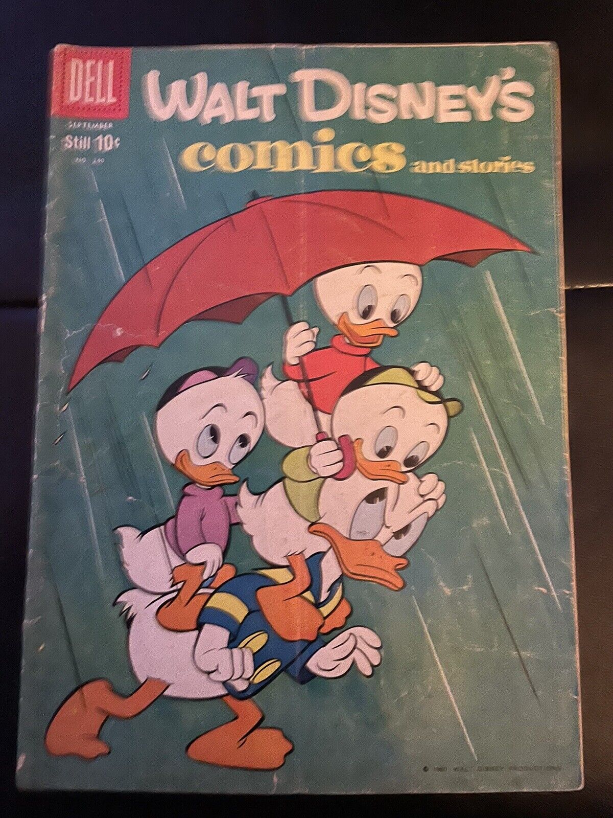 Dell Walt Disney's Comics And Stories #240 1960 - slight tear on the cover