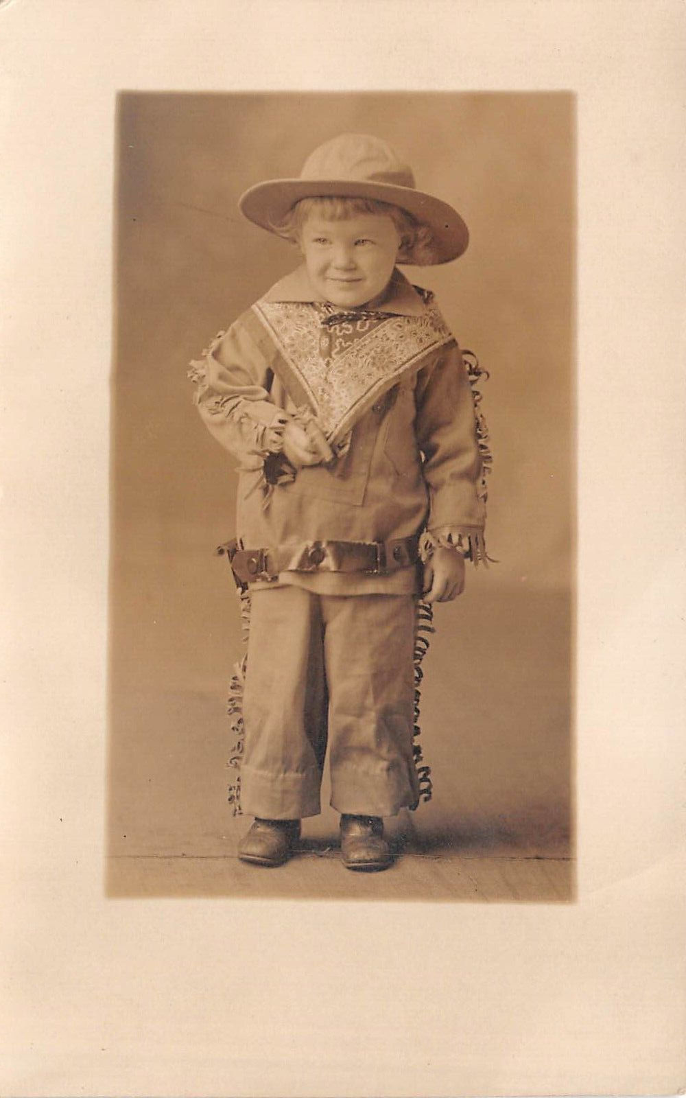 RPPC Very Cute Young Child Dressed As A Cowboy Holding c1910 Postcard
