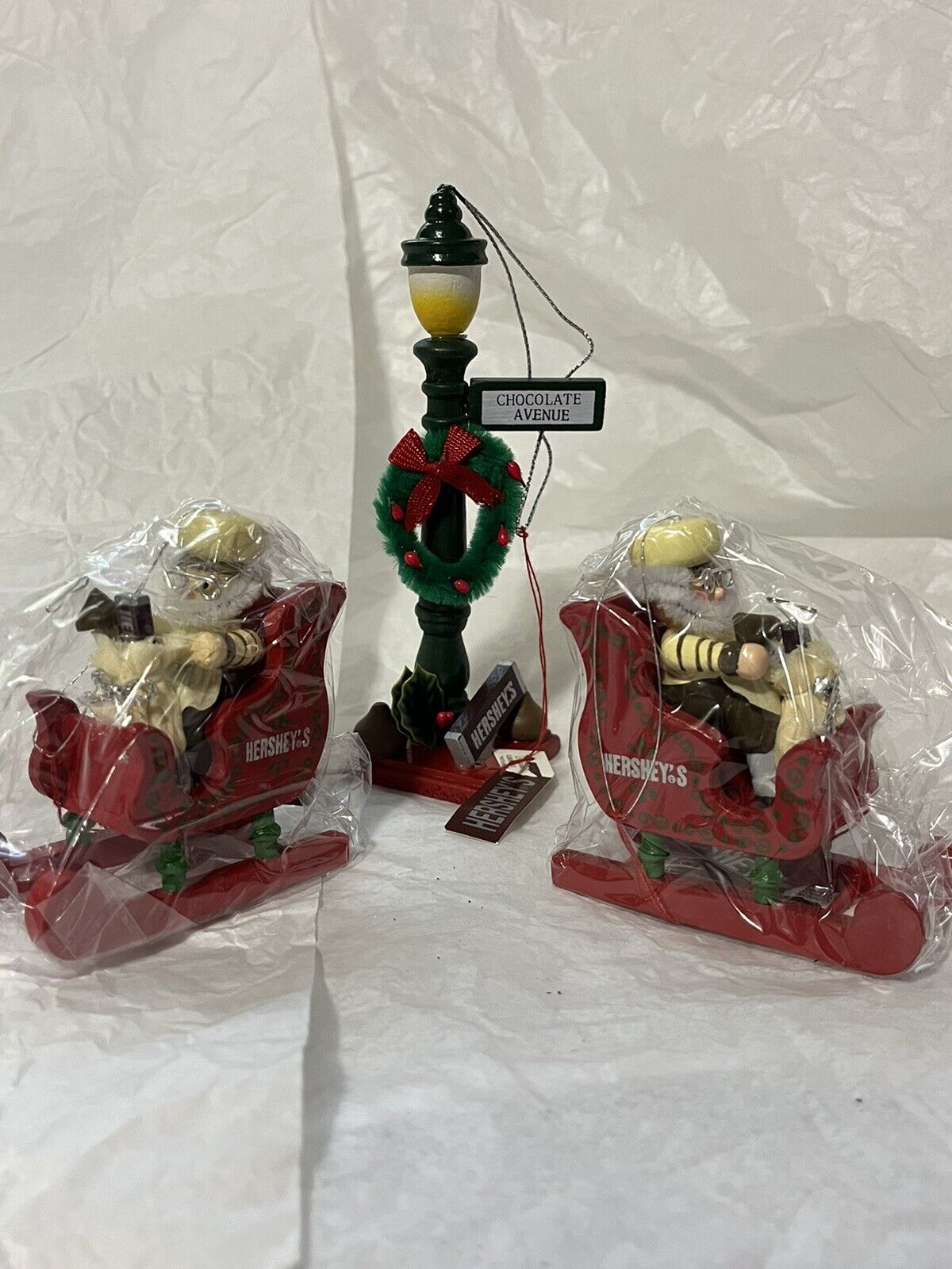 3 Vintage Hershey World Christmas Ornaments / 2 Sleighs / 1 Lamp Post 1990 /NEW