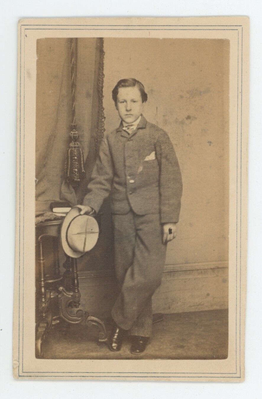 Antique CDV Circa 1870s Handsome Boy Holding Dapper Hat Fredricks New York, NY