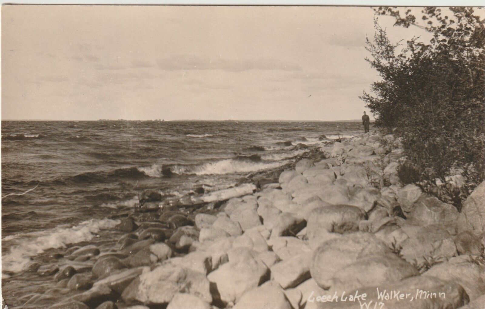 RPPC WALKER, MINN. POSTCARD Leech Lake, Man Standing on Shore