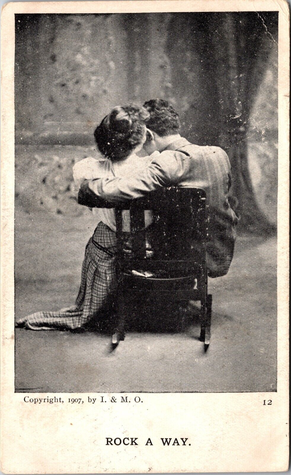 1907 Rock A Way Romantic Couple Sharing Chair Vintage Postcard