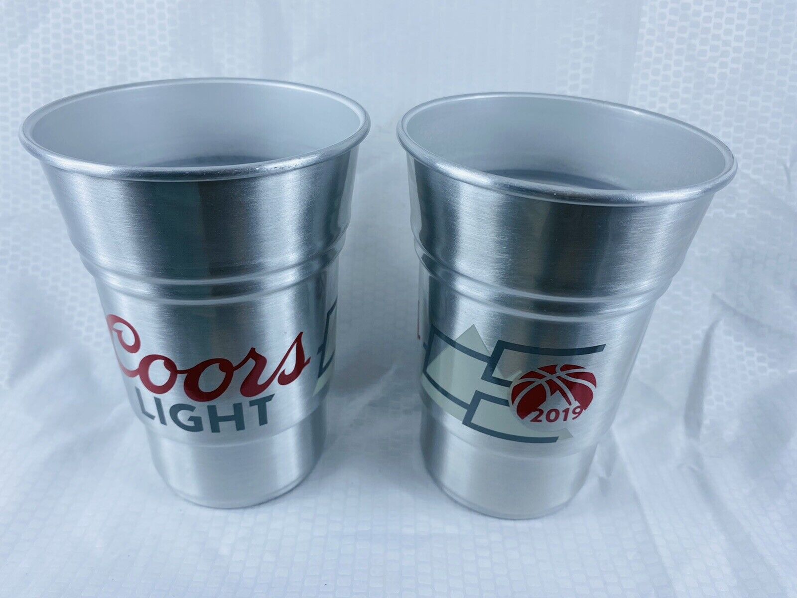 Two COORS LIGHT 2019 MARCH HOOPS ALUMINUM 22 OUNCE CUPS - NEW