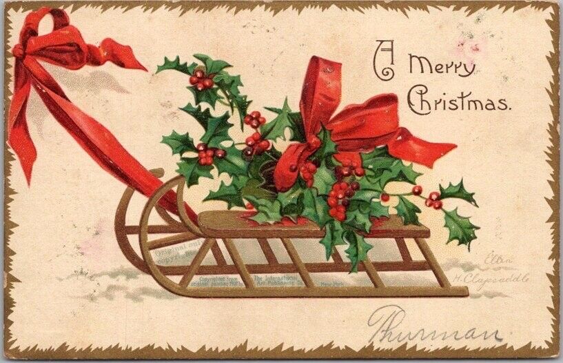 Vintage Artist-Signed CLAPSADDLE Merry Christmas Postcard Holly on Sled / 1907