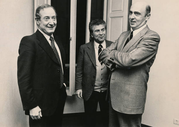 Italian politicians Giorgio Napolitano and Luciano Barca smiling - 1970 Photo