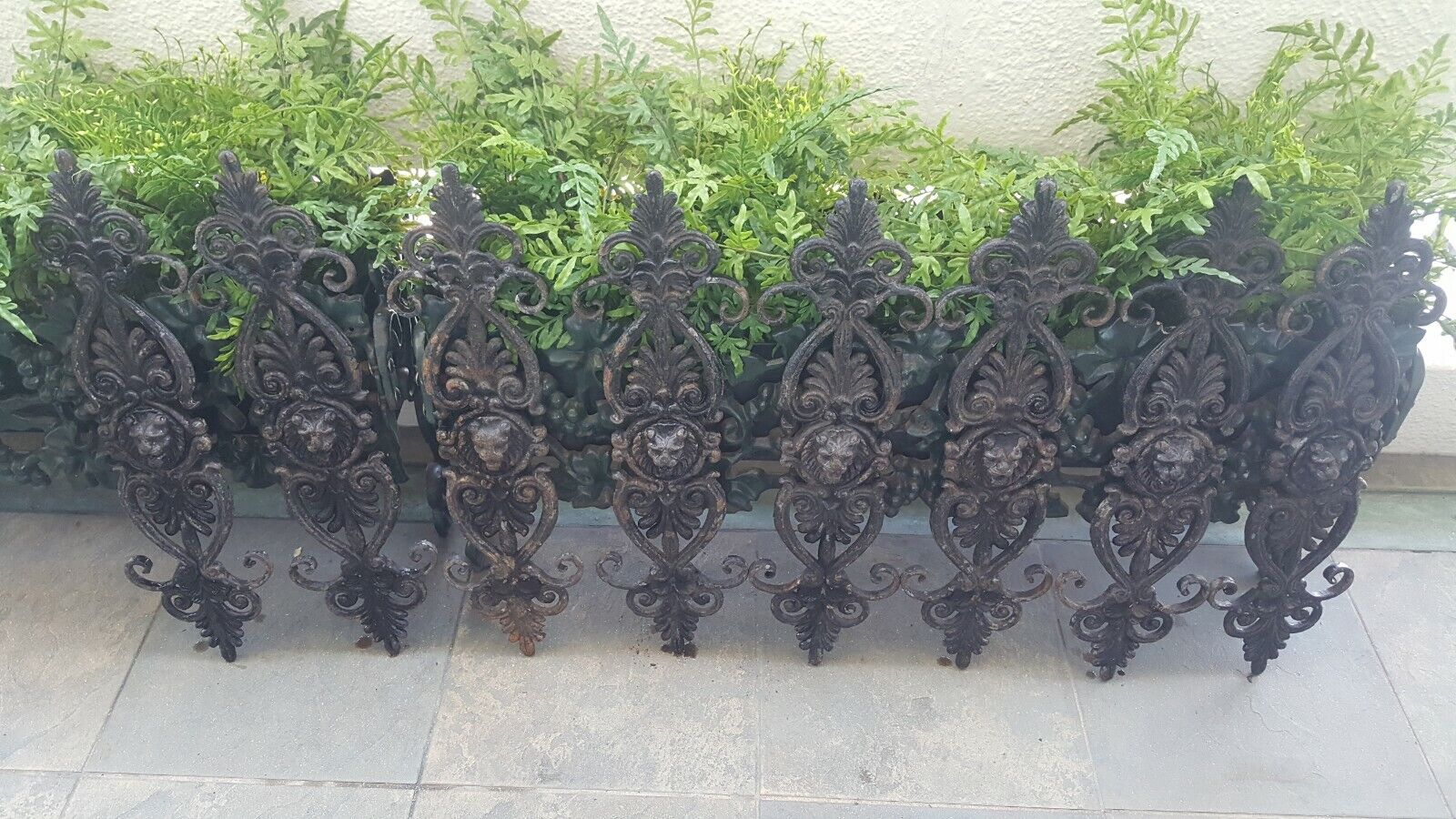 Eight (8) 19th Century Lion Head Iron Pieces Garden-Interior from NY Townhouse