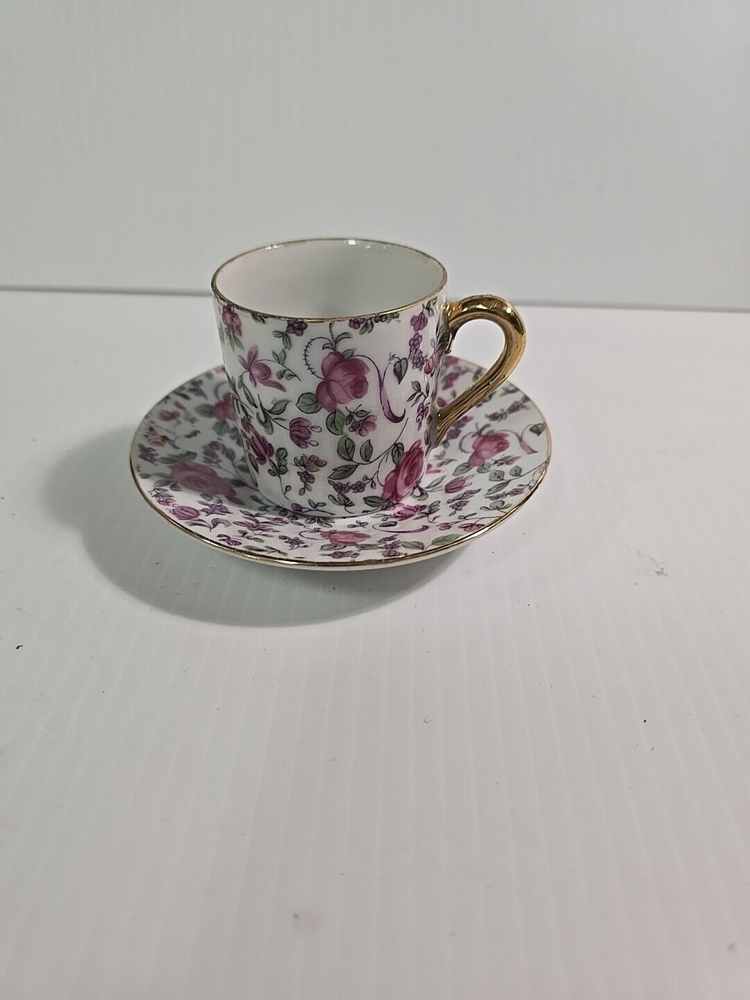Vintage Porcelain Handpainted Demitasse Cup And Saucer Violets Gold Handle 