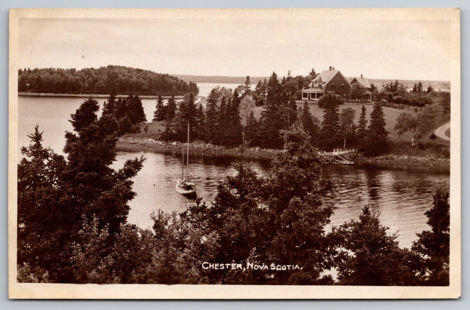 Beautiful View of Home and Boat. Chester Nova Scotia Real Photo Postcard RPPC