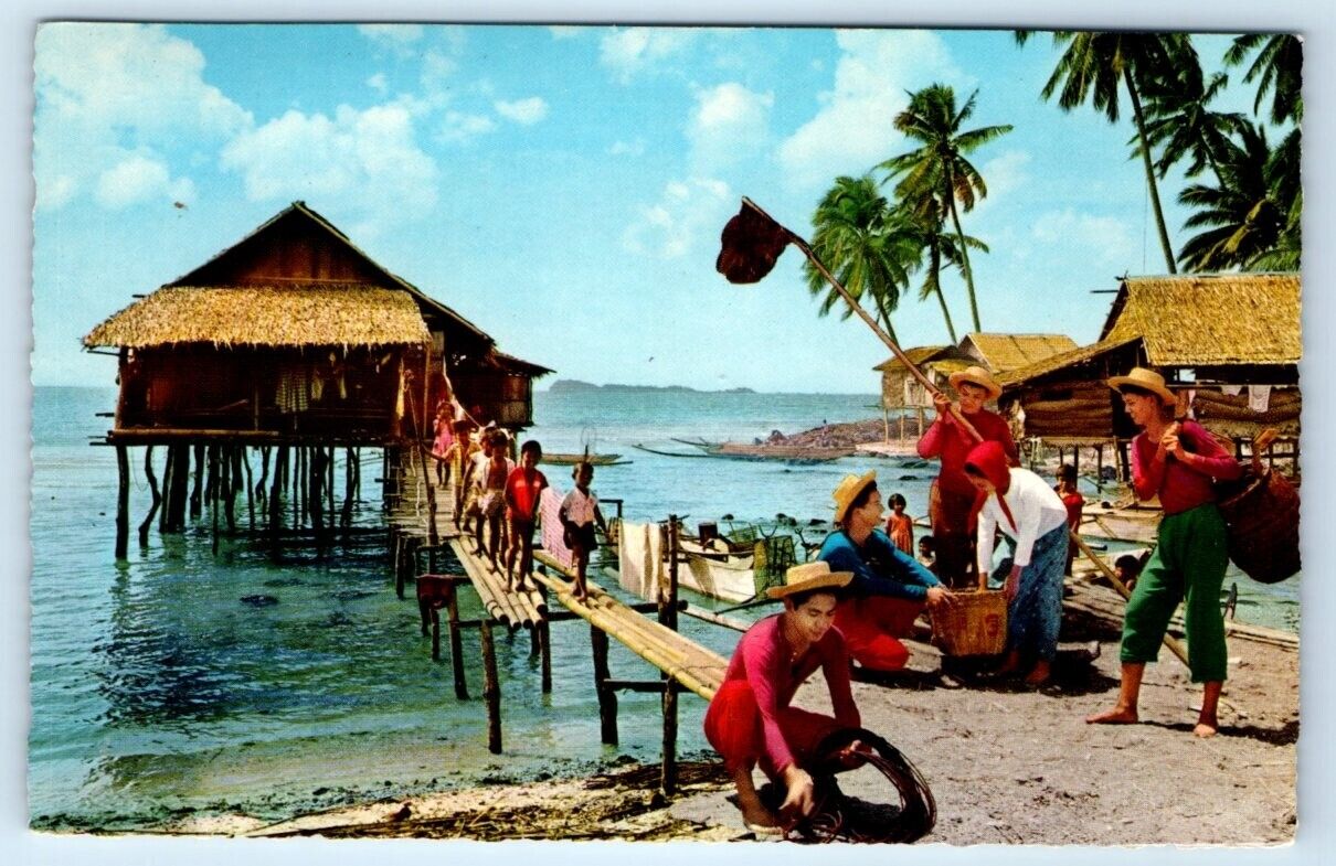 Fisherman preparing for work native huts PHILIPPINES Postcard