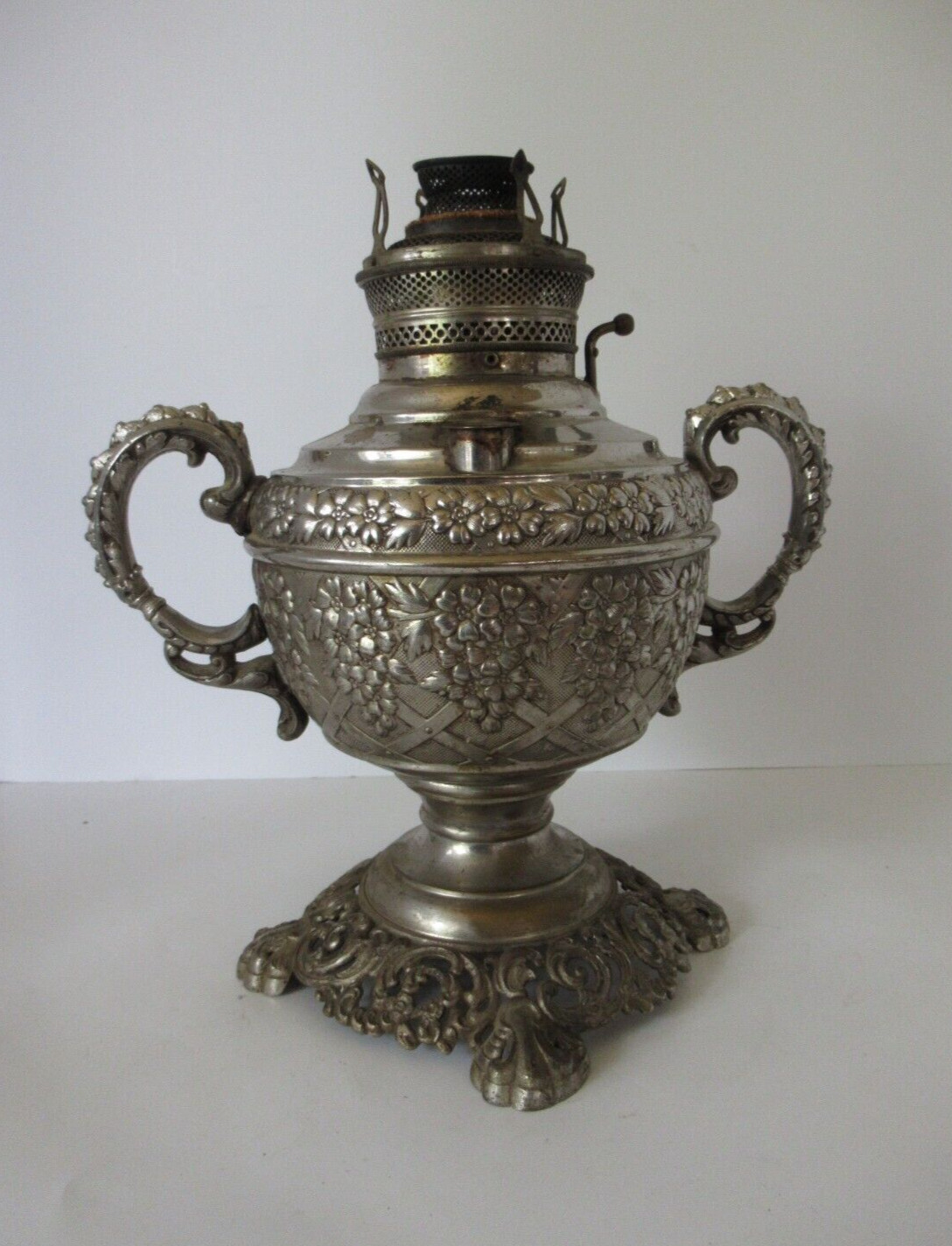Antique Silver Parlor oil lamp The Juno Lamp urn shape ornate handles repousse