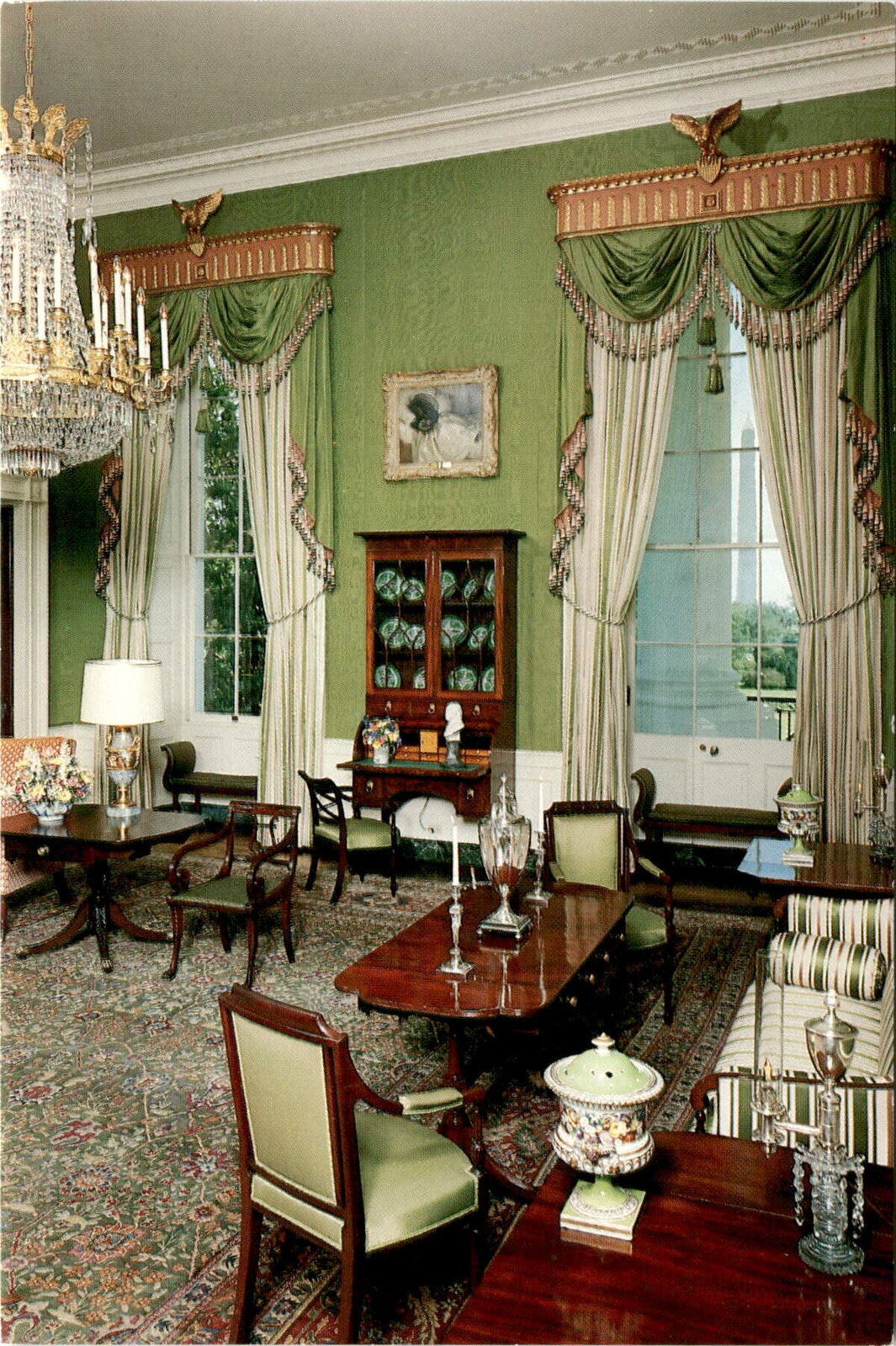 Elegant watered-silk Green Room, historic White House drawing room.