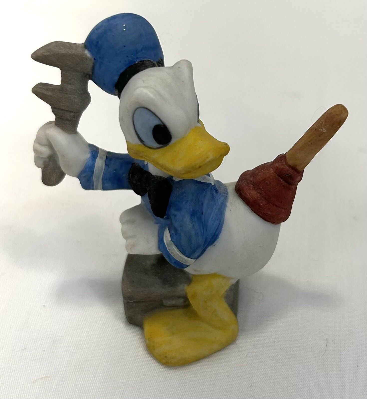 Vintage Donald Duck Holding Wrench Plunger on Tail Figurine Walt Disney