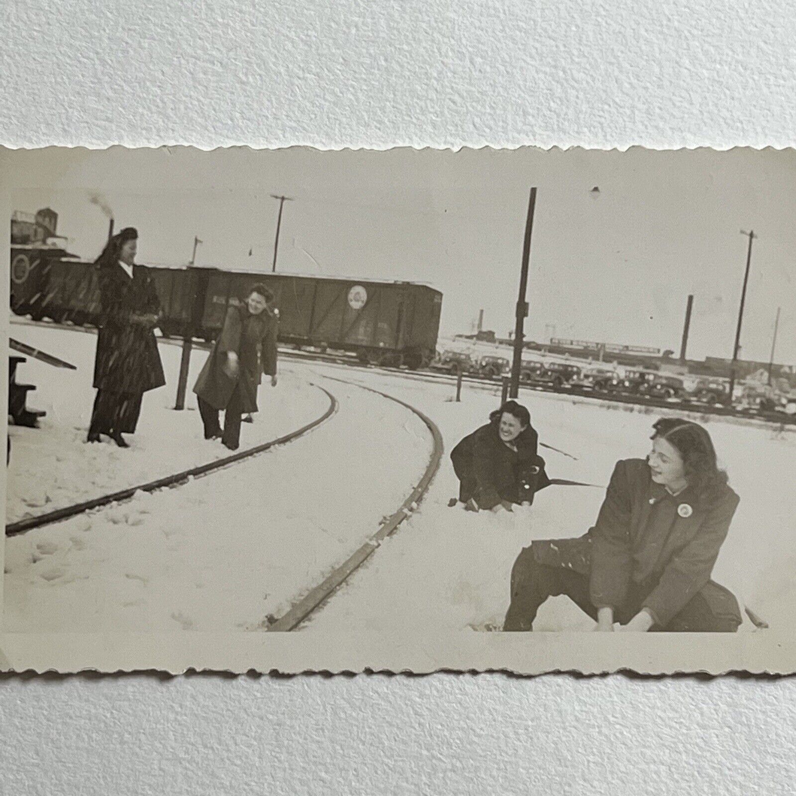 Vintage Snapshot Photograph Beautiful Women Having Snowball Fight Train Tracks