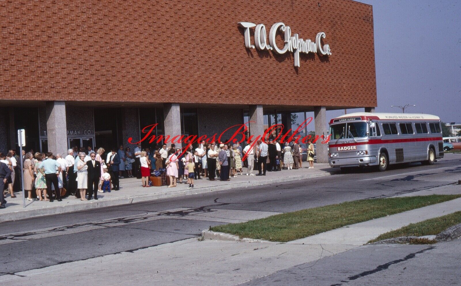 1966 35mm slide. Badger bus outside a T.A. Chapman store at a Mall in Milwaukee