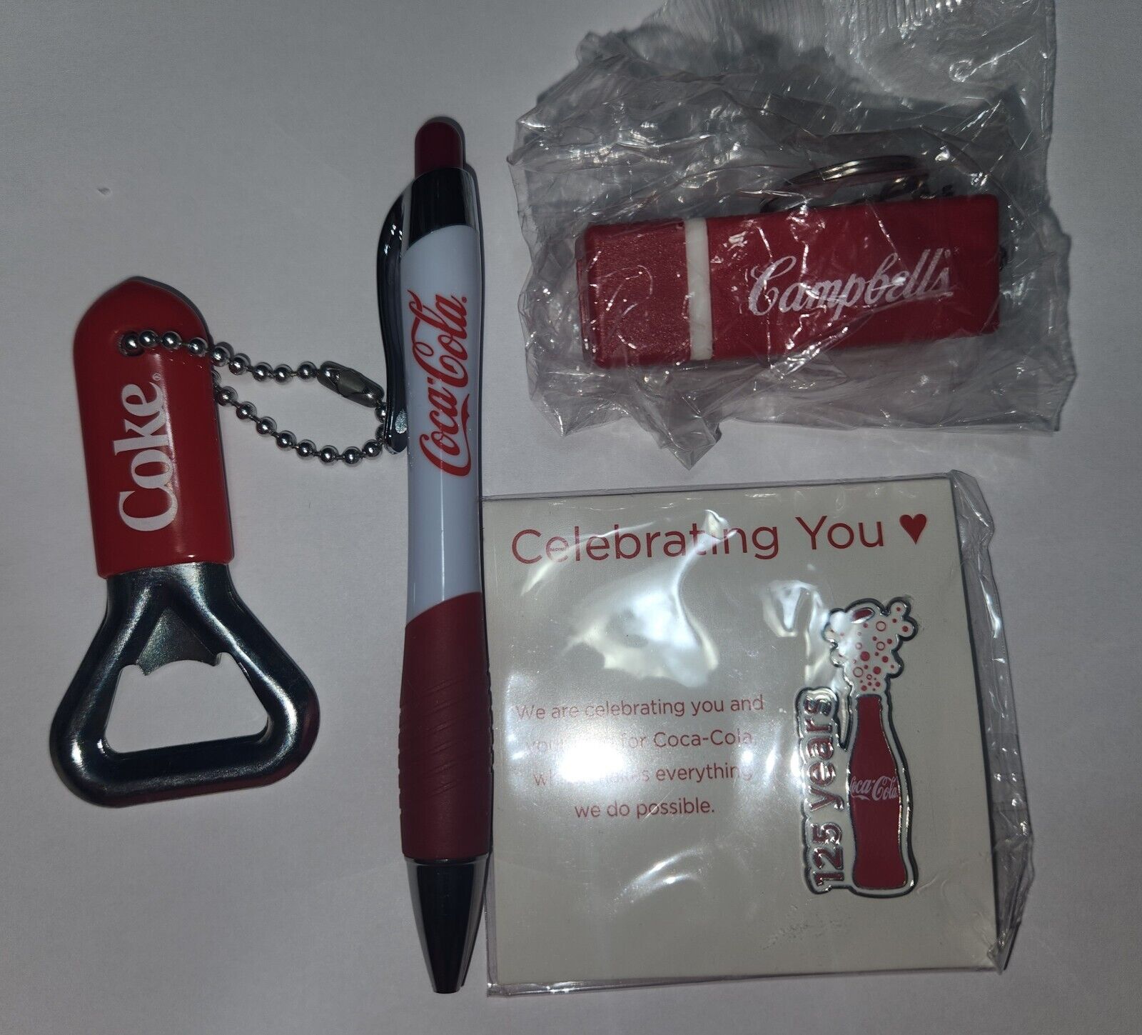 Collectible Coca-Cola 125 Year Anniversary Pin, pen, flash light, bottle opener 