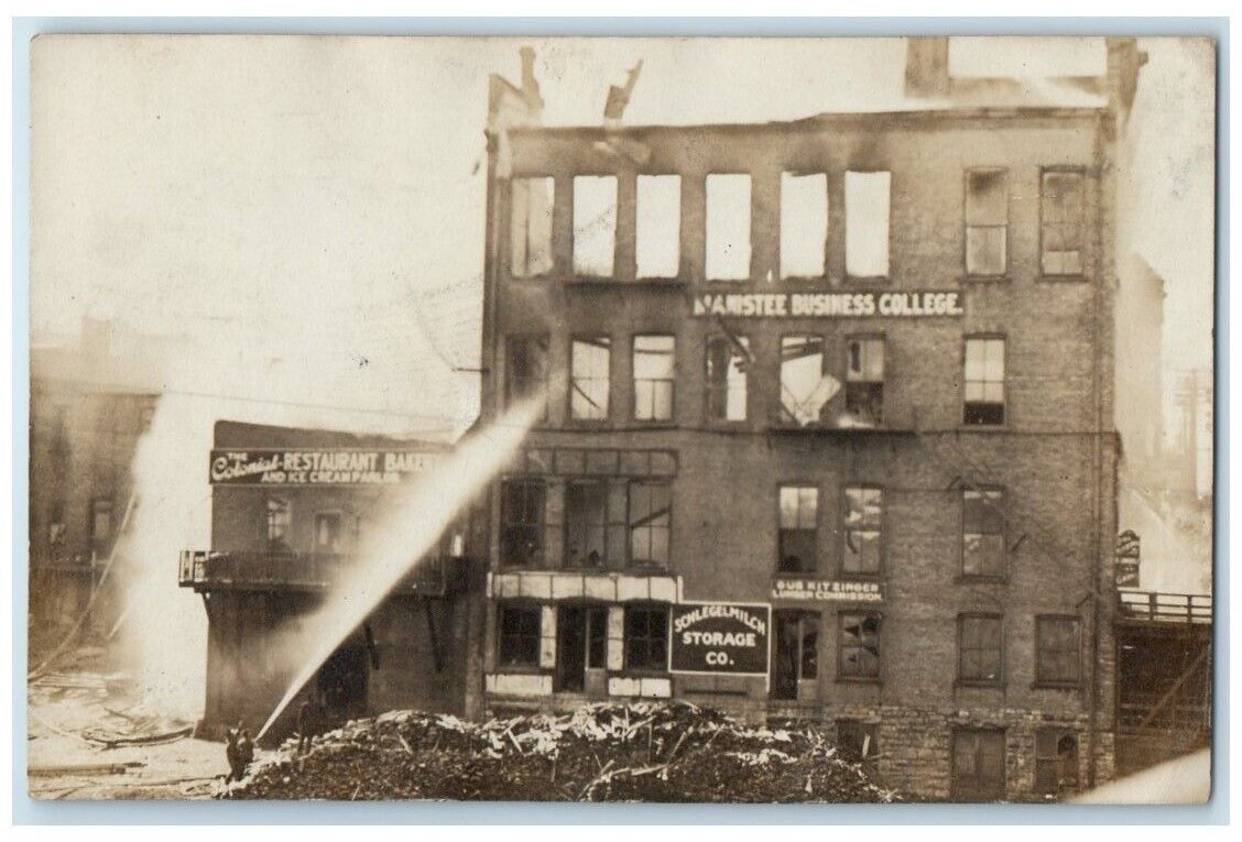 1909 Fire Disaster Fireman Hose Building Ruins Manistee MI RPPC Photo Postcard