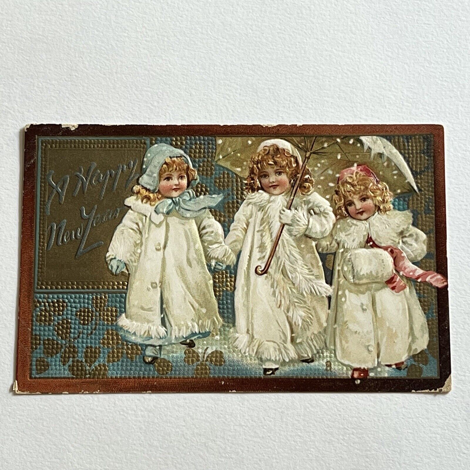 Antique Embossed Tuck’s Postcard Adorable Children Girls Umbrella Snow New Year