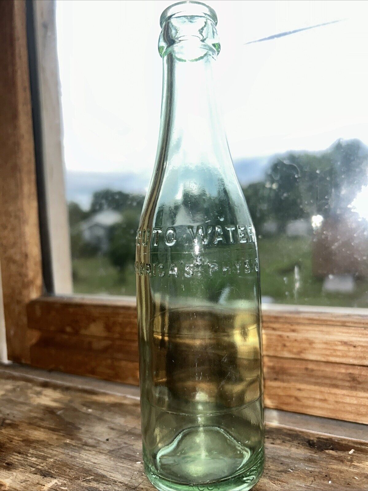 Antique Glass Crown Top Bottle - Pluto Water