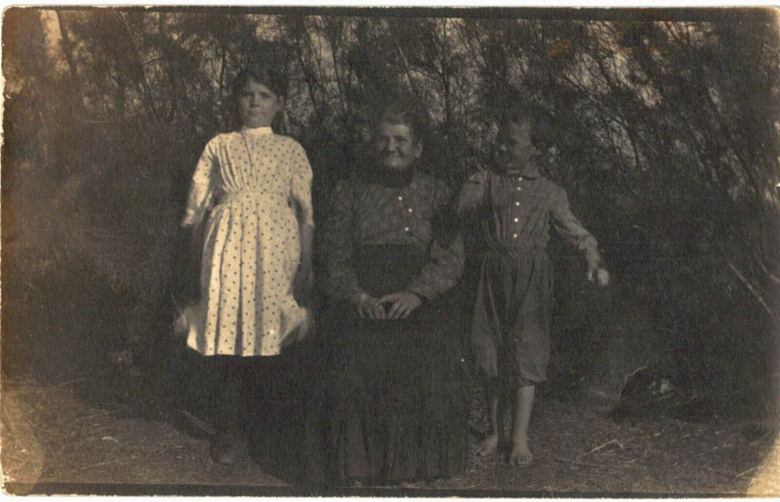 RPPC Postcard Woman and 2 Children - VELOX (diamonds in corners)  1907 — 1914
