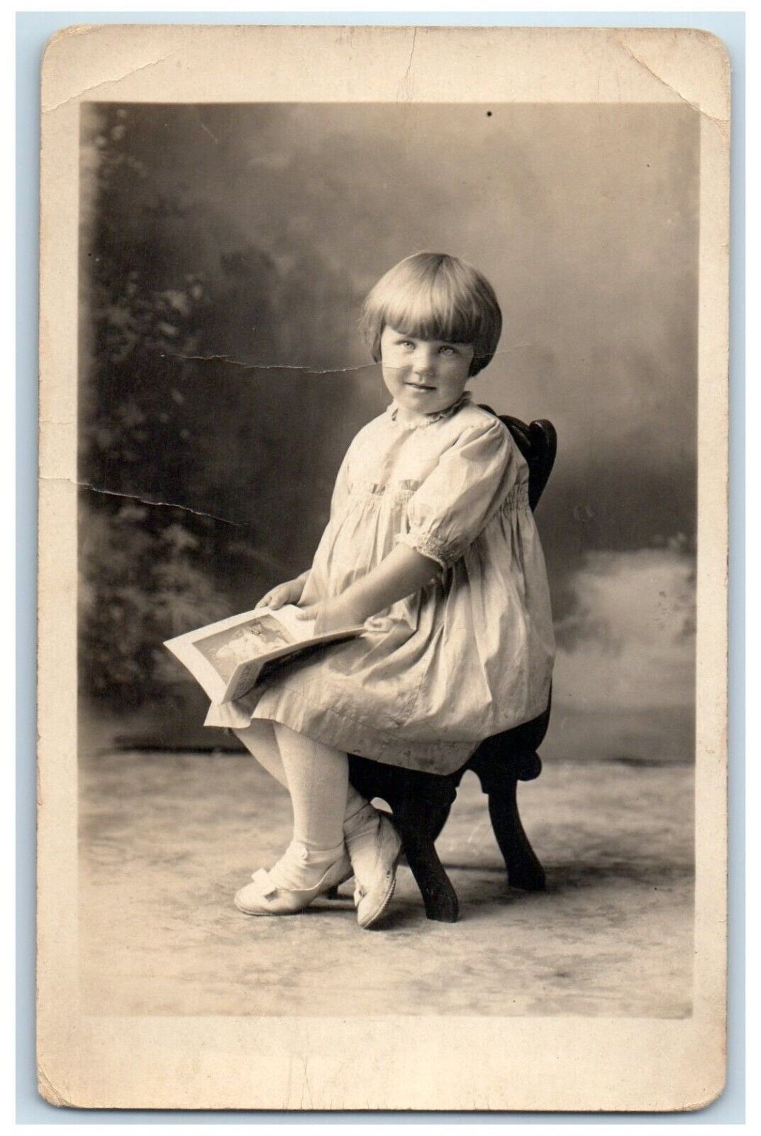 c1910\'s Girl With Studio Light Magazine RPPC Photo Posted Antique Postcard