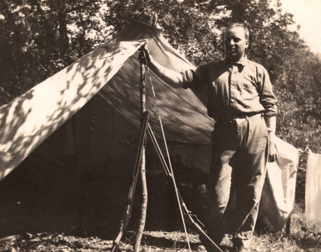 RPPC Man Pitches A Tent Shotguns Propped Up B&W ANTIQUE Postcard AZO 1904-1918