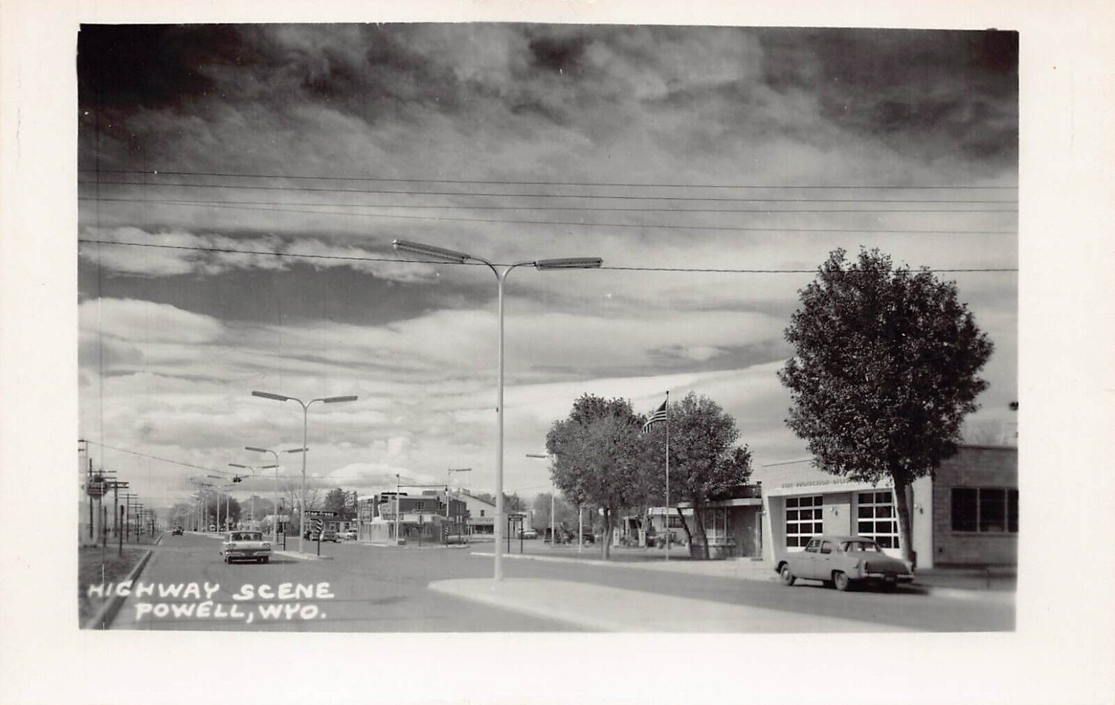 RPPC Powell WY Wyoming Main Street Coulter Ave 1950s US Hwy 14 Photo Postcard V9