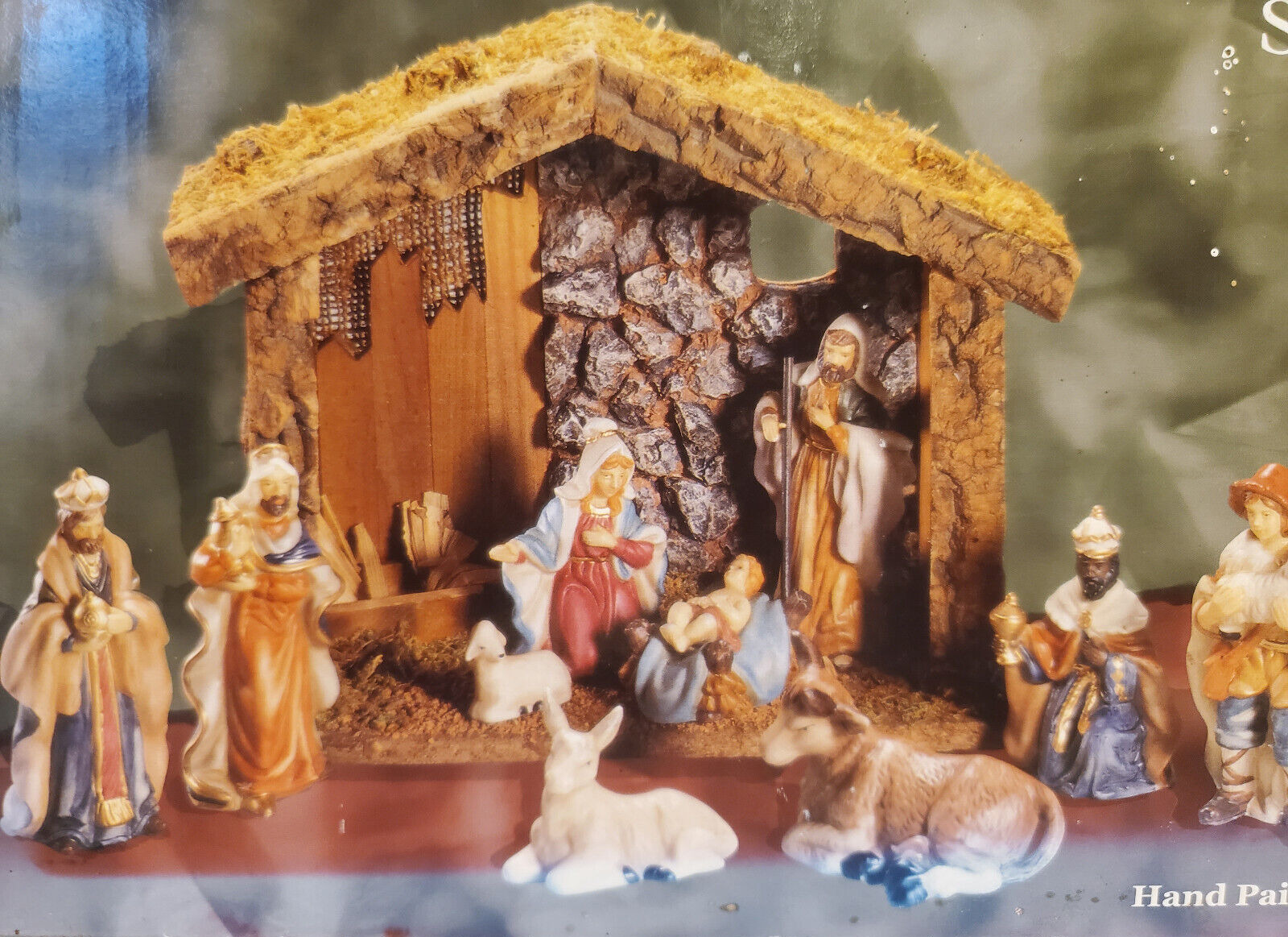 HOLIDAY TIME 10 PIECE PORCELAIN NATIVITY SET WITH WOODEN MANGER