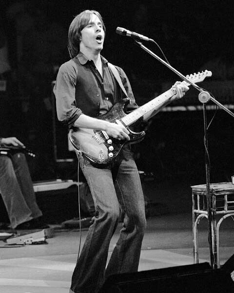 Jackson Browne plays his guitar performing on stage 1970's era 24x36 inch poster