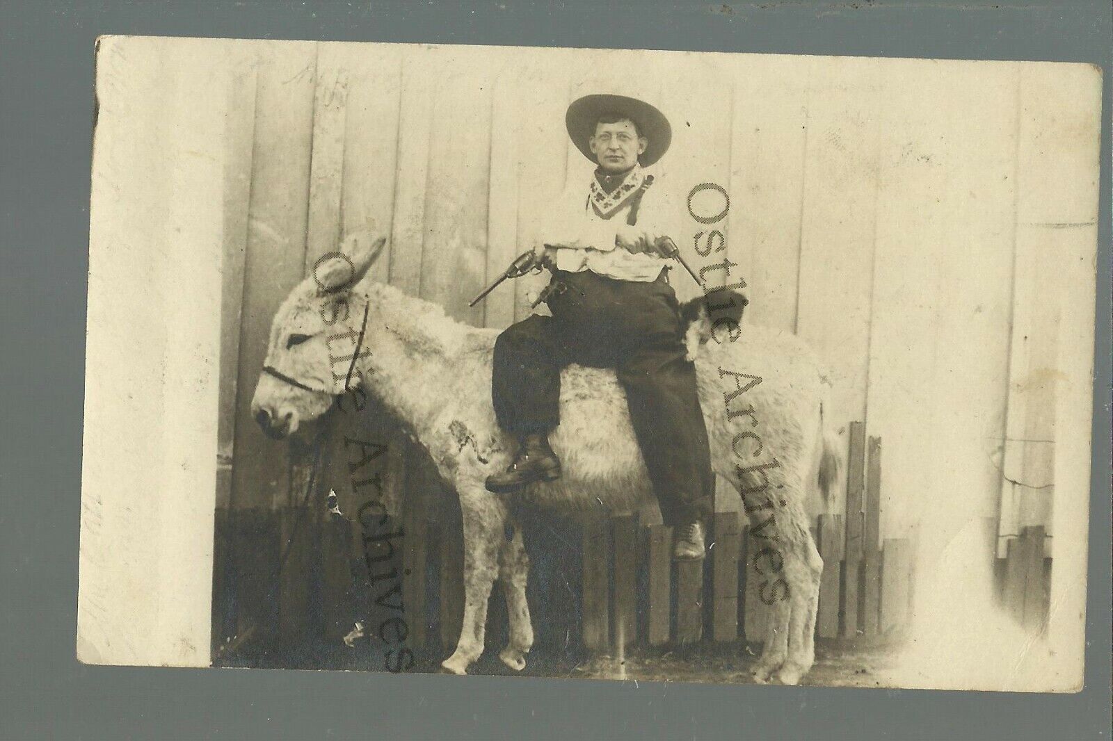 Kenefic OKLAHOMA RPPC 1912 COWBOY Burro Donkey HOLDING PISTOLS nr Durant Caddo