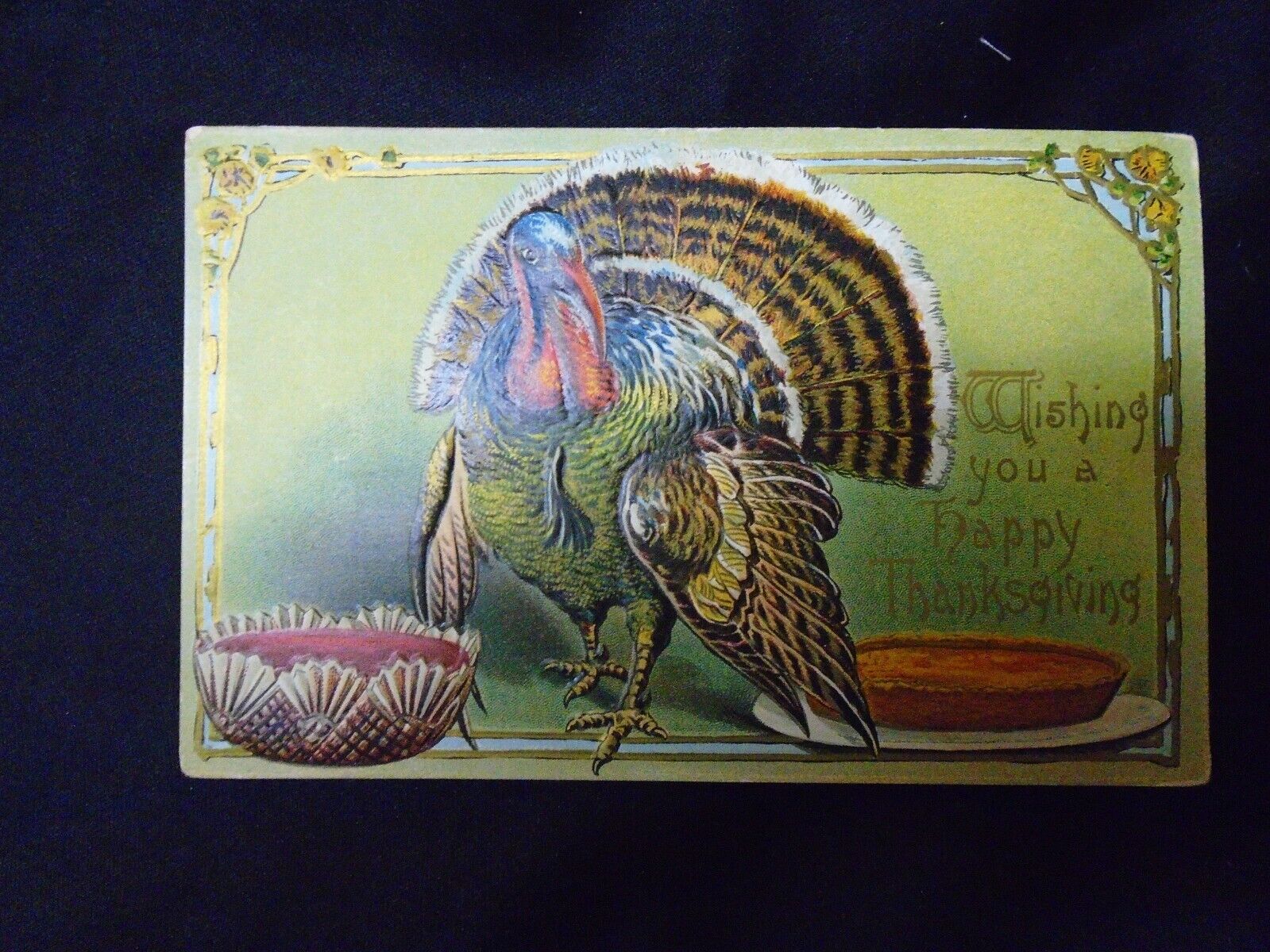 1914 Wishing You A Happy Thanksgiving, Turkey With Pies Embossed Postcard